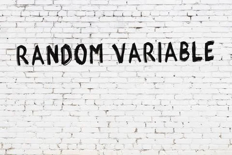  Inscription random variable written with black paint on white brick wall. 스톡 사진