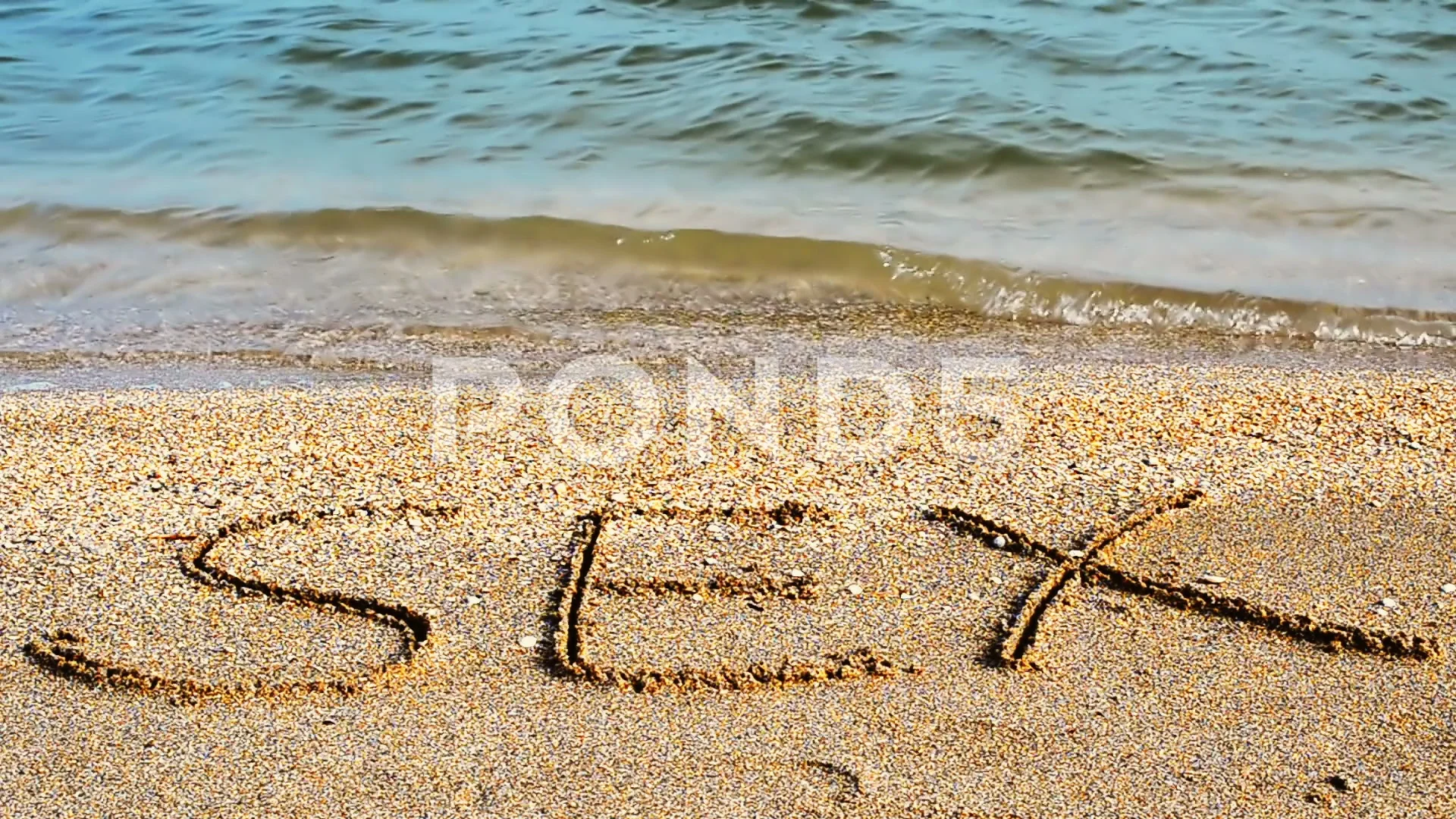 Inscription on sand sex. An inscription on the beach.