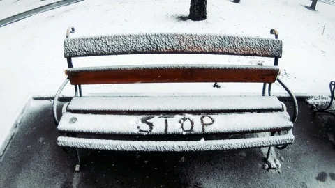 The inscription "stop" on the bench. Video stock 126791948