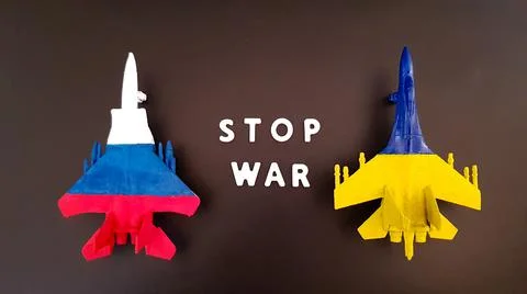 The inscription stop the war in white letters on a black background. images o Stock Photos