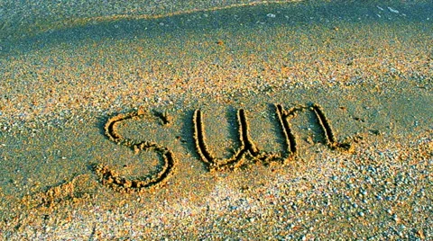 Inscription the sun on sand, the beach. Stock Footage