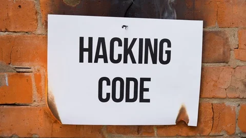 The inscription word Hacking Code burns, smoke and turns into ashes. Stock Footage 117815813