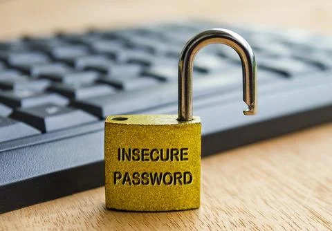 Insecure Password text engraved on padlock with keyboard background. Passwo.. Stock Photos