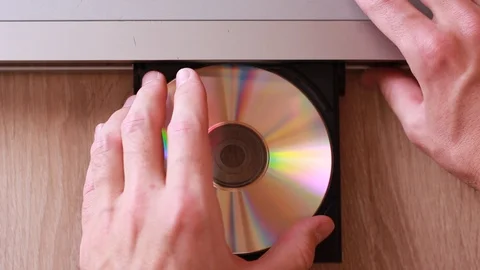 Inseritng disc into DVD player 動画素材 88245033