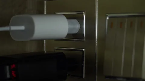 Insert and remove two plugs from the socket Stock Footage 255449800