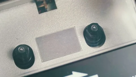 Insert an Audio Cassette into a Tape Recorder and Play Video stock 74767370