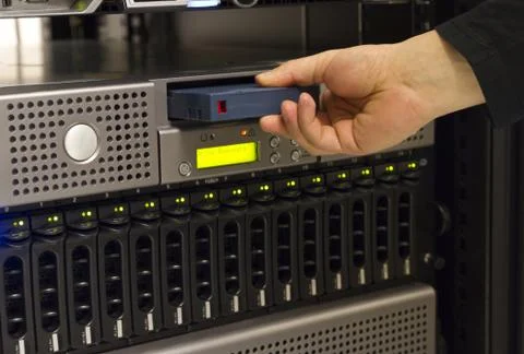 Insert backup tape Stock Photos