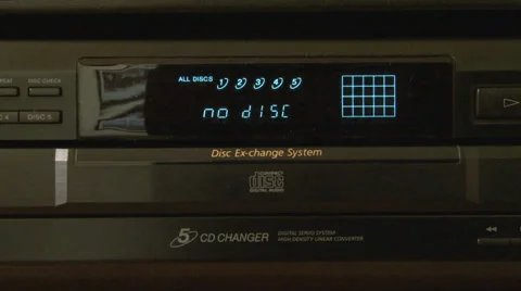 Insert CD Into Player Stock Footage 38650178