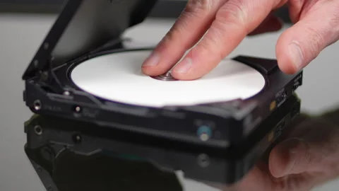 Insert CD in portable cd player. Stock Footage 334663800