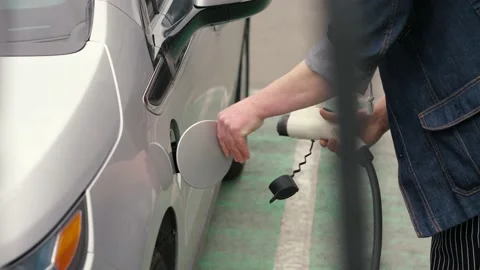 Insert connector EV Stock Footage 196294803