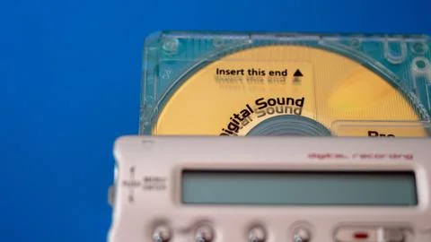 Insert disc in minidisc player Stock Photos