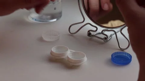 Insert The Lenses Video stock 47447632