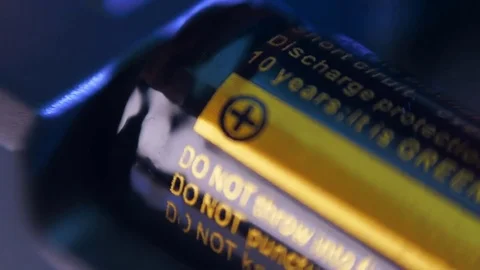 Insert new batteries into the remote control Stock Footage 82684533