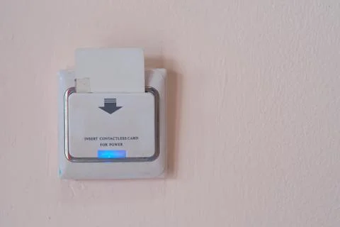 Insert Old key card in electronic lock Stock Photos