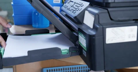 Insert paper to printer . Stock Footage 172289716