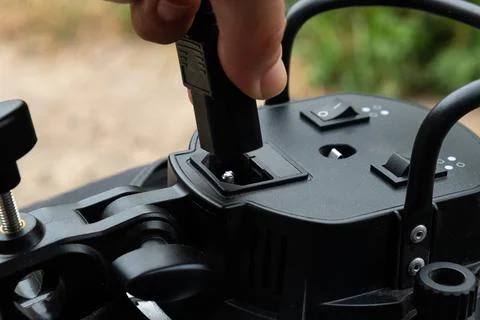 Insert the power cable into the electrical equipment Stock Photos