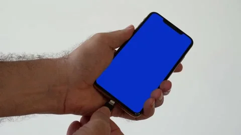 Insert security U2F token for multi-factor authentication on phone. Blue Screen Stock Footage 137839670