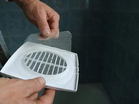 Insert a strainer in the fan housing Stock Photos