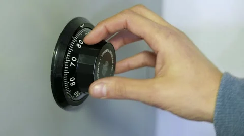 Insert the strongbox combination Stock Footage 61477319