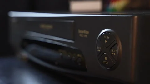 Insert VHS Tape and Press Play Stock Footage 309423170