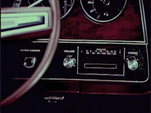INSERTING 8-TRACK TAPE INTO STEREO Stock Footage 22111521