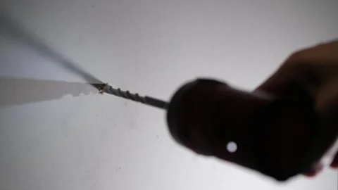 Inserting anchors through a drywall. Stock Footage 340449458
