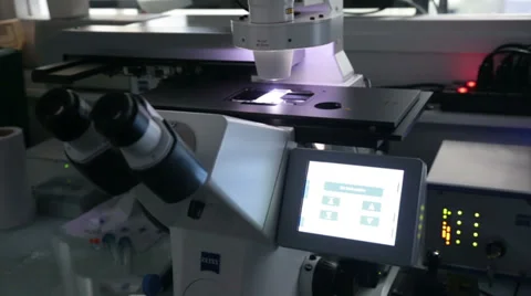 Inserting and extracting samples in modern microscope Stock Footage 34315113