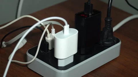 Inserting and removing the plug from the socket Stock Footage 255450613