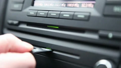 Inserting and Removing a SD Card from a Car Stock Footage 46503432