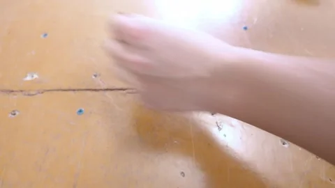 Inserting And Stabilizing Screws Along Crack In Flooring Surface Stock Footage 329107169