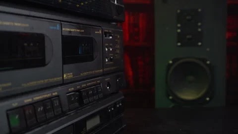 Inserting Audio Cassette Tape and Pressing Play Button on Double Deck Recorder Stock Footage 334530134
