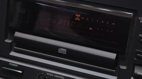 Inserting a blank cd disk into the cd recorder Stock Footage 108543066