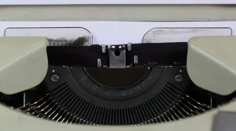 Inserting a blank sheet into a Typewriter Stock Footage 61842557