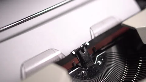 Inserting Blank White Paper in Vintage Typewriter, Close Up Stock Footage 259856038