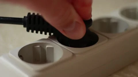Inserting cable into a socket Stock Footage 64622433