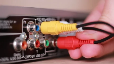 Inserting cables into electronic device Vídeo Stock 88245049