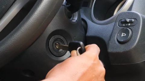 Inserting car ignition key Stock-Footage 334639519