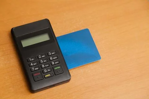 Inserting a card into a credit card machine. black machine. Credit card conce Stock-Fotos