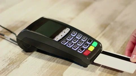 Inserting card into pos terminal and making payment Stock Footage 65392662