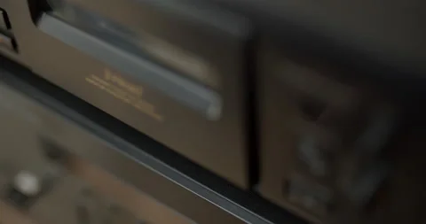 Inserting casette in audio player, close up view Video stock 133912243