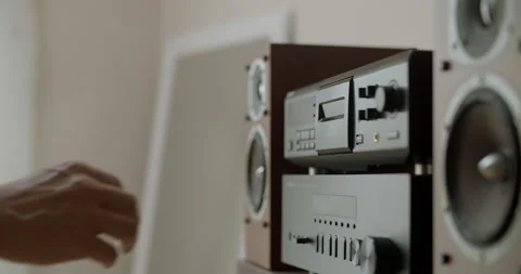 Inserting casette in audio player Stock Footage 131647315