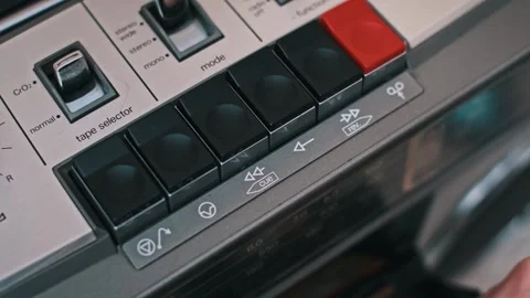 Inserting Cassette and Pressing Play on Retro Audio Deck Stock Footage 303921511
