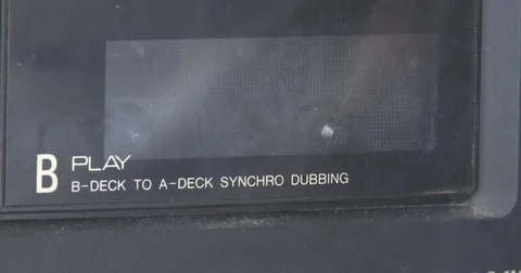 Inserting Cassette Tape into Boom Box Radio - Close Up Stock Footage 77429038