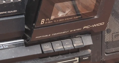 Inserting Cassette Tape into Boom Box - Close Up Stock Footage 85377215