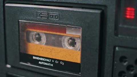 Inserting Cassette Tape: Retro Audio Player Stock Footage 303709381