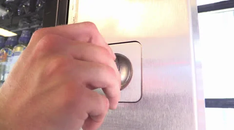 Inserting coin for cold drink Stock Footage 25787230