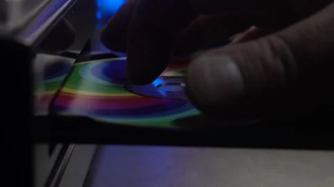 Inserting Colorful Compact Disc Into CD Player, Music Media From 1990's Stock Footage 324836160