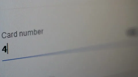 Inserting credit card number on internet Stock Footage 97542741