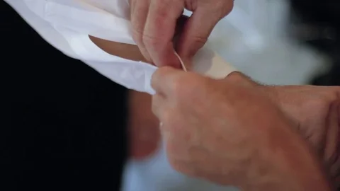 Inserting Cuff Links Stock-Footage 73836552