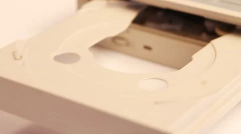 Inserting a disc into CD or DVD rom Stock Footage 7751359